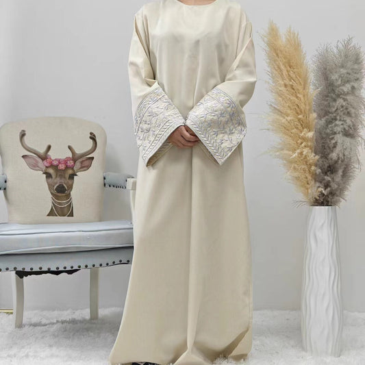 Elegant Closed Abaya With Embroidered Sleeves in Cream Waffle - clearance online only